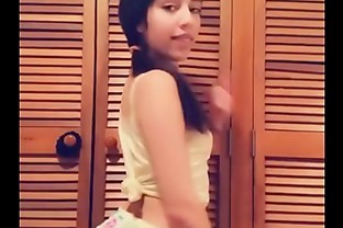 Latina Brunette doing Striptease
