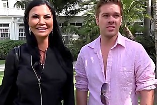 Jasmine Jae is a hot MILF with big tits and a pierced clit. The trio go to the beach where Jasmine exposes her pussy for the public to see!