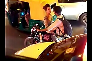 Shaved head Couple with Vibrator bike