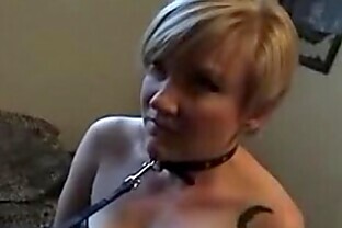 Submissive white slut on a leash