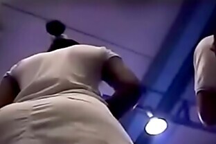 Upskirt fit black mom standing in line